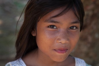 On the way to Hang En Cave, we pass the only village of Ban Doong - with just 35-40 inhabitants. I smile at this girl and point to my camera. She smiles back and nods.