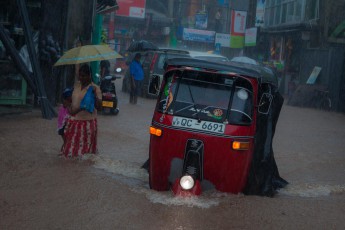 After only a few minutes of monsoon rain, the streets of Moragalles have turned into rivers.