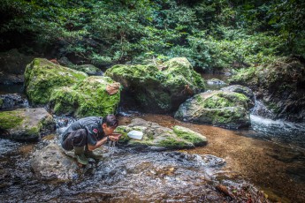 Late in the afternoon we reach a river. Atan and Masrizal go ahead to inspect the campsite. After a few minutes they are back. Excited words on Bahasa, the main language of Indonesia, go back and forth. Nuri turns to me: "We can't camp up there. There's a 7 meter long phython in the water."