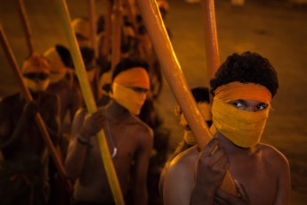 These flag bearers are waiting in front of the tooth temple for their mission, which will take many hours.