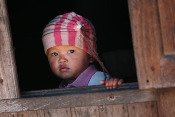 Burma/Myanmar: Half curiosity, half shyness in a Ngwe Palaung village near Namshan.