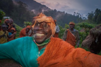 This is the 'Rhythm of Africa'! The shaman of the Batwa community gives himself over to the groove of the chants and drums of his village - one more photo - and then I'm all in!