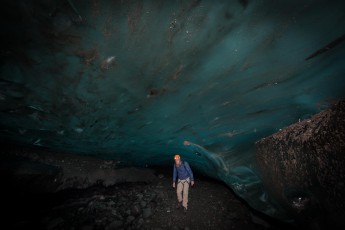 I hike a bit through the ice cave at the southern end of Vatnajökull.
