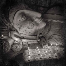 Prayer at the reclining Buddha near Shwesandaw pagoda, Bagan.
