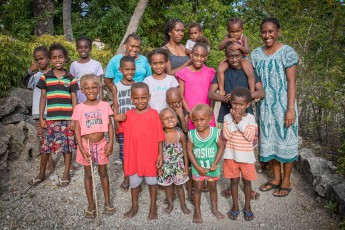 Women and children of the village on the southern shore of Moso Island.