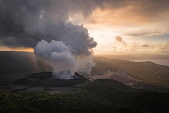 The constantly rumbling and ash-blowing Yazur volcano at sunset.
